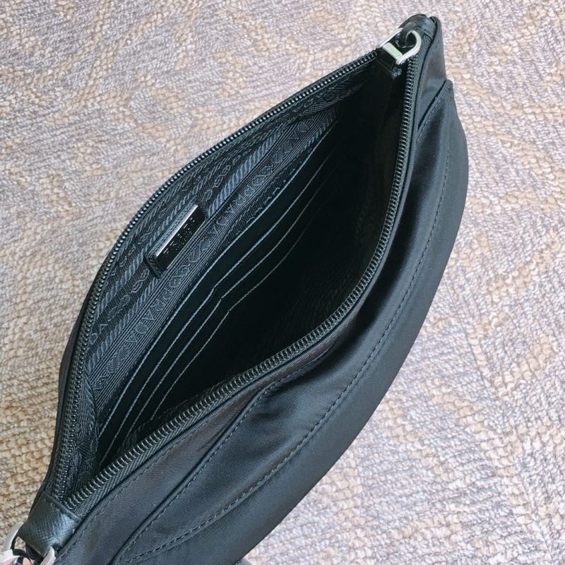Pra*a clutch bags